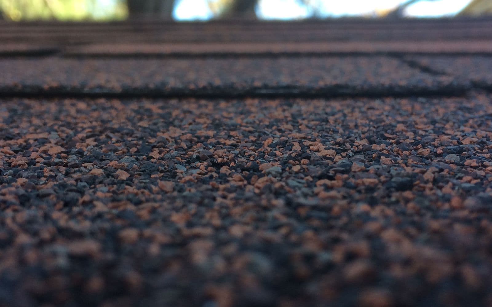 Close-up of asphalt shingles on a residential roof